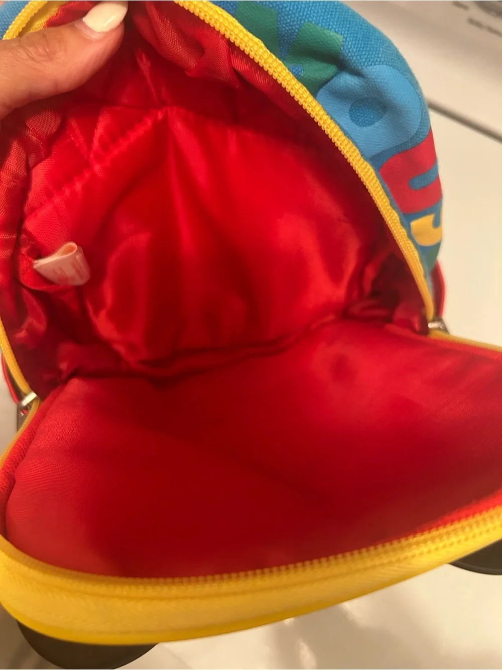 Disney Red Mickey Mouse Kids Backpack with Teal Pockets and Yellow Trim